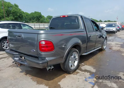 2002 Ford F-150 Lariat from USA, damaged, VIN 1FTRW07322KC24433